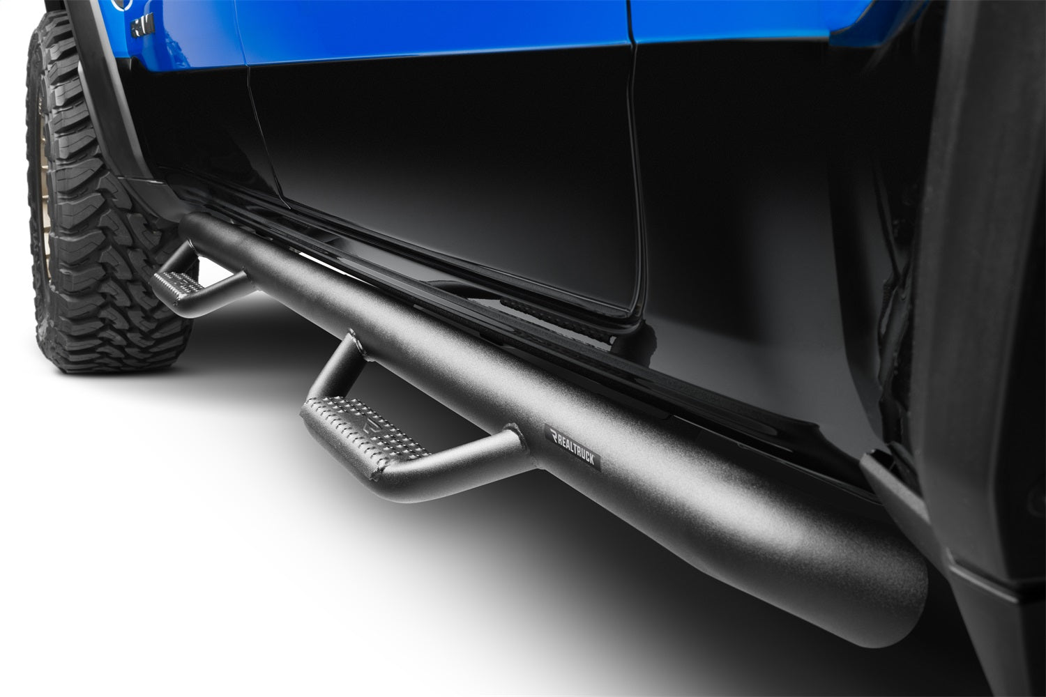 https://www.catalograck.com/ImgVDHR/NFA/NFBnfab-nerf-step-textured-2022-ram-1500-trx-blue-studio-01.jpg